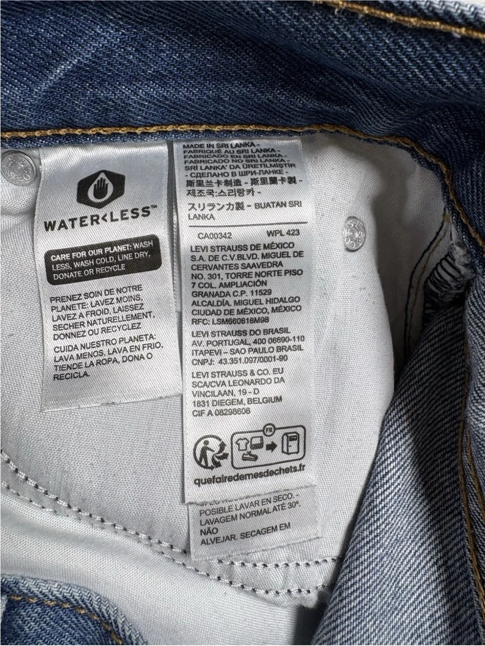 Levis '94 Baggy Jeans size 25 Medium Wash Relaxed Fit Straight Leg Mid Rise